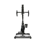 Front view of a compact indoor stationary bike with handlebars and a wide base for home cardio workouts.