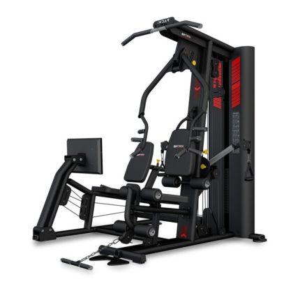 Black multi-station home gym with leg extension/press attachments, cable pulleys, weight stack, and a side monitor for workouts.