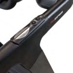 Close-up of a black bicycle handlebar with an integrated control pad and two buttons