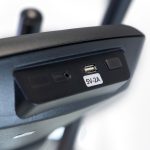 Close-up of a device's back panel with a USB port labeled 5V-2A for charging.