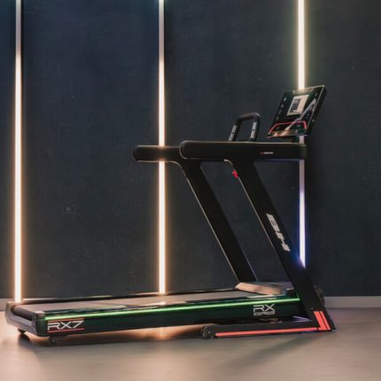 Black exercise treadmill with illuminated vertical light strips in a modern gym; brand RX7 on the side and a screen mounted at the front.