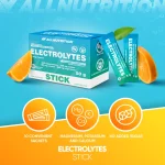 Blue Electrolytes Stick box with two sachets and orange halves against a turquoise background.