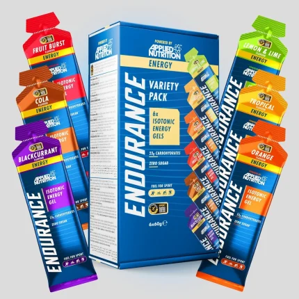 Blue Endurance energy gel box labeled 6x60g surrounded by colorful gel pouches in flavors like Fruit Burst, Cola, Blackcurrant, Lemon & Lime, Tropical, and Orange.