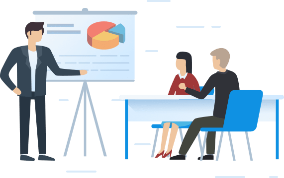 Man presenting a pie chart on a flip chart to two seated colleagues in a meeting room
